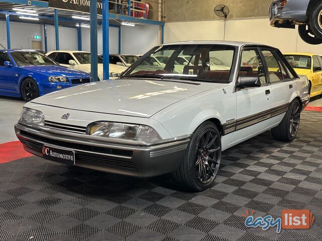 1986 HOLDEN COMMODORE SL VL 4D SEDAN