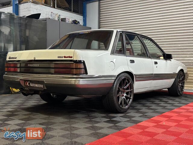 1986 HOLDEN COMMODORE SL VL 4D SEDAN