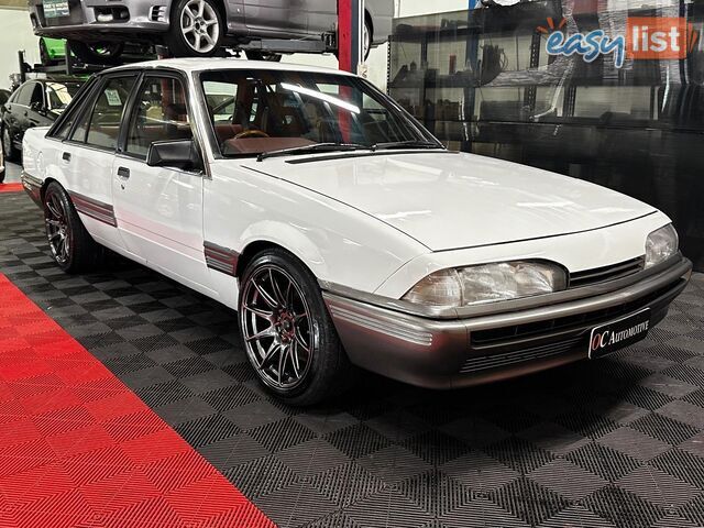 1986 HOLDEN COMMODORE SL VL 4D SEDAN