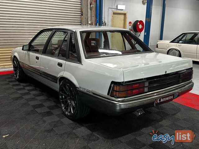 1986 HOLDEN COMMODORE SL VL 4D SEDAN