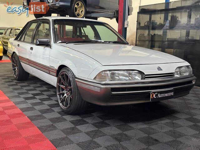 1986 HOLDEN COMMODORE SL VL 4D SEDAN