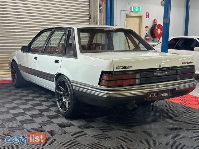 1986 HOLDEN COMMODORE SL VL 4D SEDAN