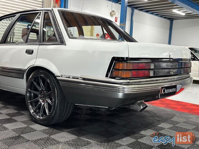 1986 HOLDEN COMMODORE SL VL 4D SEDAN