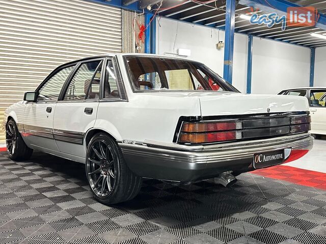 1986 HOLDEN COMMODORE SL VL 4D SEDAN