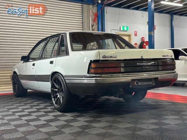 1986 HOLDEN COMMODORE SL VL 4D SEDAN