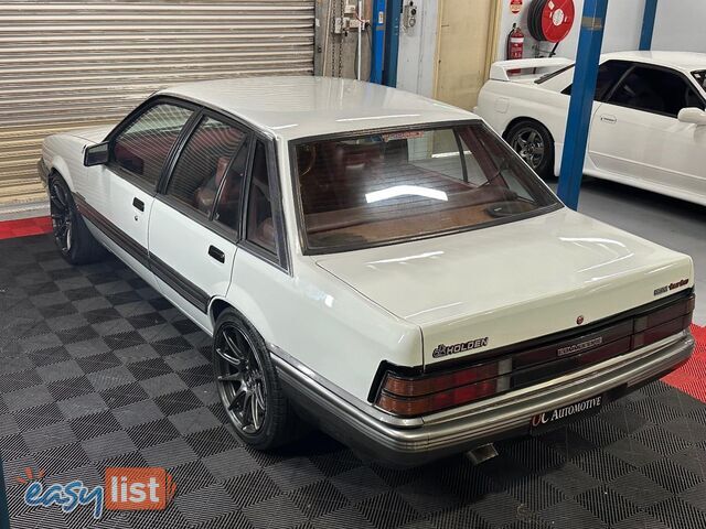 1986 HOLDEN COMMODORE SL VL 4D SEDAN