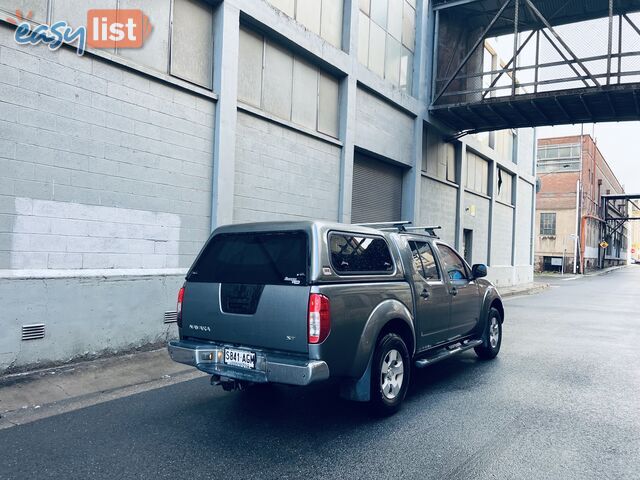 2010 NISSAN NAVARA ST (4x4) 5 SP AUTOMATIC DUAL CAB P/UP TURBO DIESEL