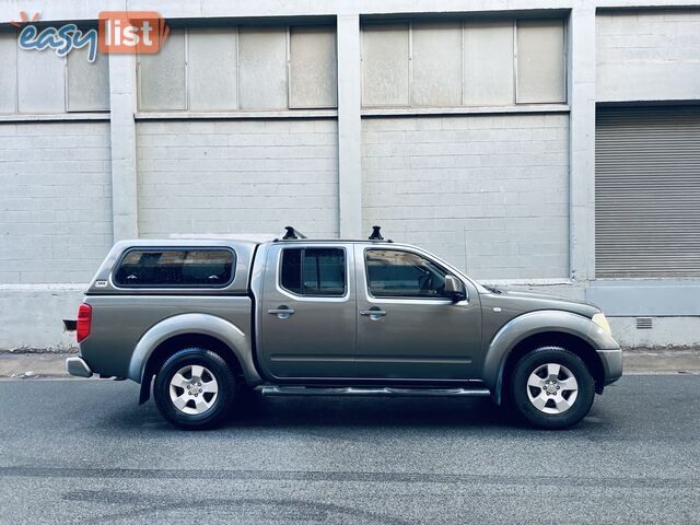 2010 NISSAN NAVARA ST (4x4) 5 SP AUTOMATIC DUAL CAB P/UP TURBO DIESEL