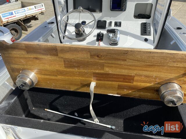 2018 Australian Masters Marine 5700 Seaclass Centre console. Powered by a 200hp fuel injected four s