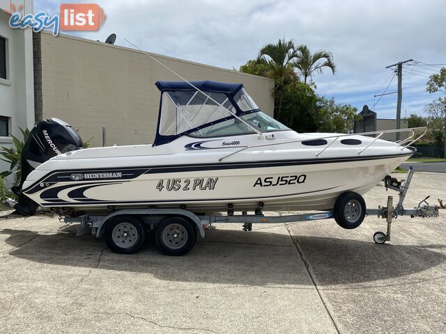 2004 Huntsman 6000 Series Half Cabin