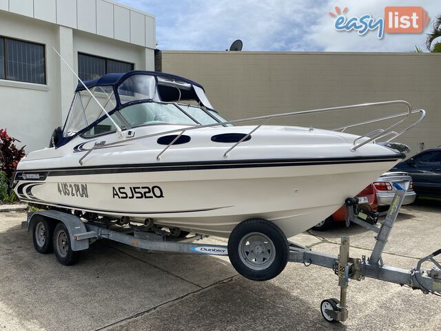 2004 Huntsman 6000 Series Half Cabin