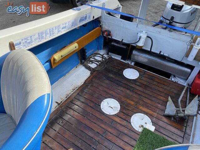 5m Seafarer cuddy cabin powered by 60hp Honda fuel injected four stroke  
