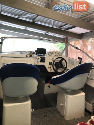1996 Seafearer powered by Evinrude on trailer 
