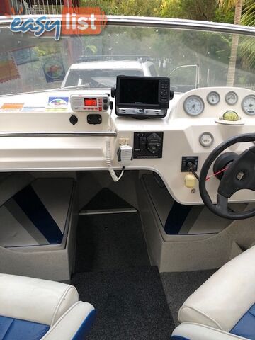 1996 Seafearer powered by Evinrude on trailer 