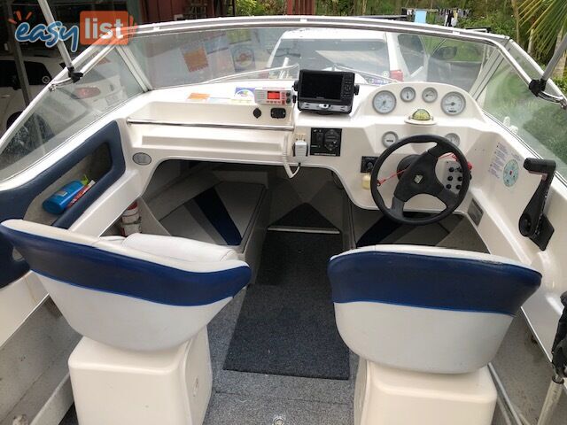 1996 Seafearer powered by Evinrude on trailer 