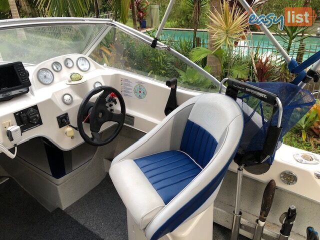 1996 Seafearer powered by Evinrude on trailer 