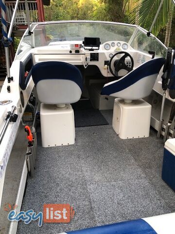 1996 Seafearer powered by Evinrude on trailer 