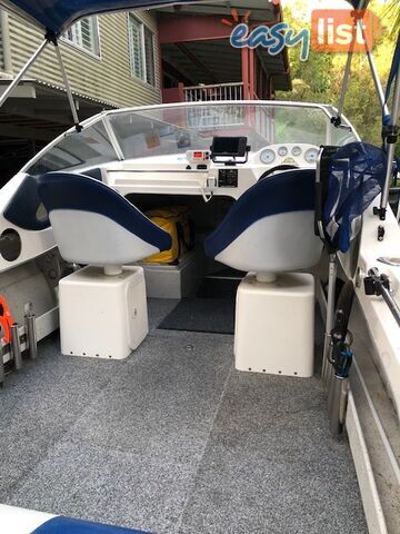 1996 Seafearer powered by Evinrude on trailer 