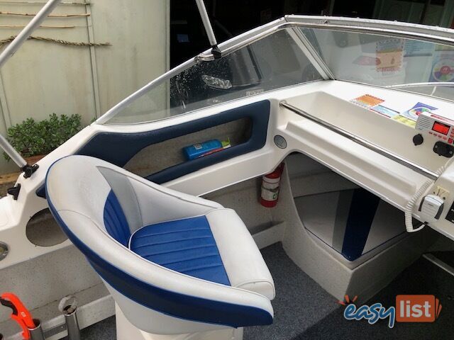 1996 Seafearer powered by Evinrude on trailer 