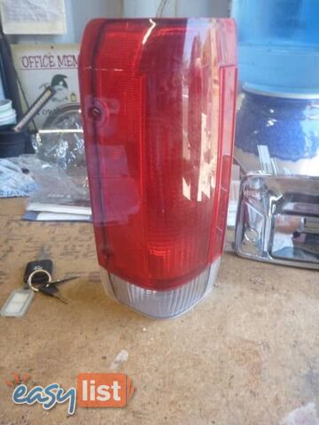 FORD F 150 TAIL LIGHT NEW IN THE BOX $125 EA WE HAVE MUCH MORE HEAD,
